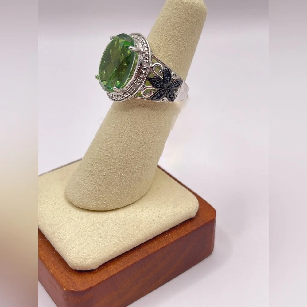 Simulated peridot in sterling silver with black rhinestone accents